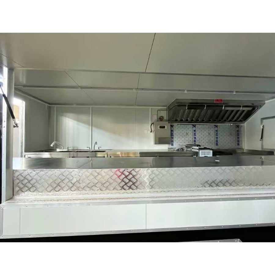 16ft mobile kitchen trailer with serving window and stainless steel equipment - also known as a food truck or concession trailer