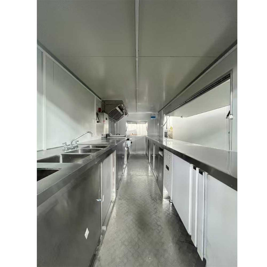 16ft mobile kitchen trailer with serving window and stainless steel equipment - also known as a food truck or concession trailer